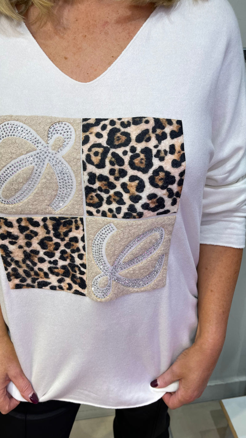 Michelle- Cream Animal Print Stud V Neck  Top