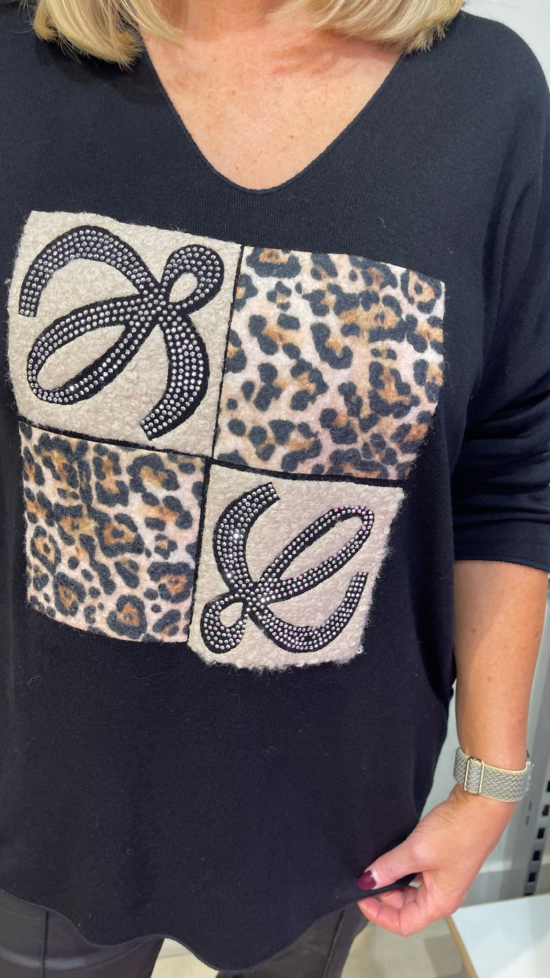 Michelle- Black Animal Print Stud V Neck  Top