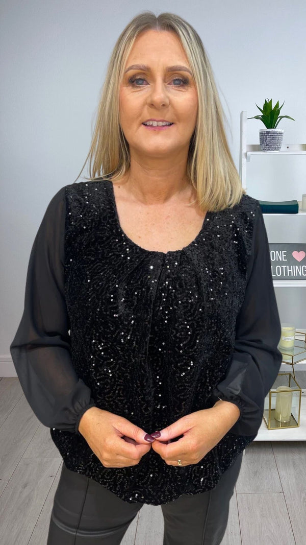 Vicky - Black Sequin lined bubble hem Top